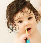 Pediatric Dentist - Brushing Teeth